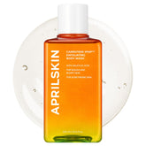 APRILSKIN Carrotene IPMP Exfoliating Body Wash bottle close-up highlighting smooth skin benefits
