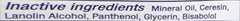 An Aquaphor Healing Skin Ointment tube sits on a bathroom sink for everyday skincare.