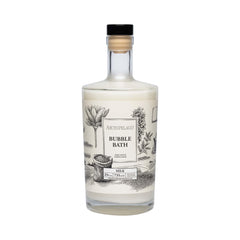 Archipelago Botanicals luxury milk bubble bath bottle pouring for a relaxing soak