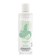 ARCTIC FOX Pistachio Macaron bottle close-up, vibrant pastel mint color with conditioning during application.