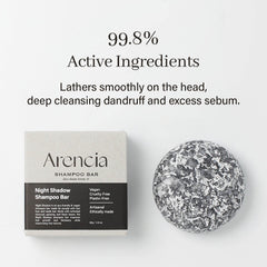 ARENCIA Night Shadow shampoo bar in hand; shows lather-ready cleansing.