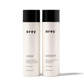 Arey Shower Duo two-pack on shelf highlights vegan anti-grey system for daily care