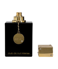 Armaf Club De Nuit Intense Women EDP saffron-spice image conveys luxurious warmth.