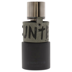 Armaf Hunter Intense bottle pour close-up showing citrus top notes ready to energize.