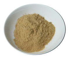 Aromine Rhassoul facial mask application shows silky paste texture for easy spa-like treatment.