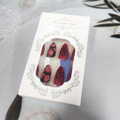 AROVFAM glossy black rose nails with a high shine finish.