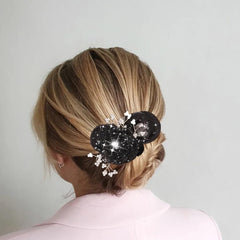 Arvintas duo pack bun makers in use for voluminous updo on long hair