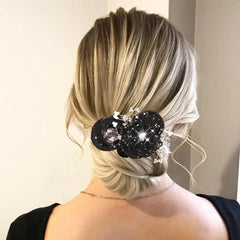 Arvintas camellia flower design adding sparkle to casual hairstyles