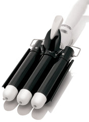 Asani Alure 3-barrel curling iron in action delivering quick beachy waves
