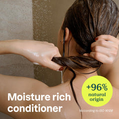 ATTITUDE Moisture Rich Hair Conditioner strands close-up shows smooth, shiny, manageable hair after use.