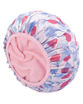 Auban Shower Cap with waterproof EVA exterior protects hair during showers.