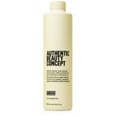 Authentic Beauty Concept Replenish Cleanser bottle shows nourishing formula for damaged hair