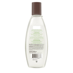 Aveeno Skin Clarifying Toner swirl on skin suggests a clear, oil-free finish.
