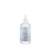 Awapuhi Wild Ginger HydraSoft glossing bottle close-up delivering instant shine
