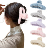 AWAYTR large claw hair clip blue provides strong hold for thick hair during workouts.