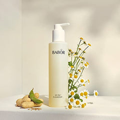 BABOR HY-ÖL cleanser massage scene showing nourishing skin care routine.