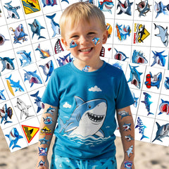 Backtopeia Shark tattoos used as party favors at a celebratory table.
