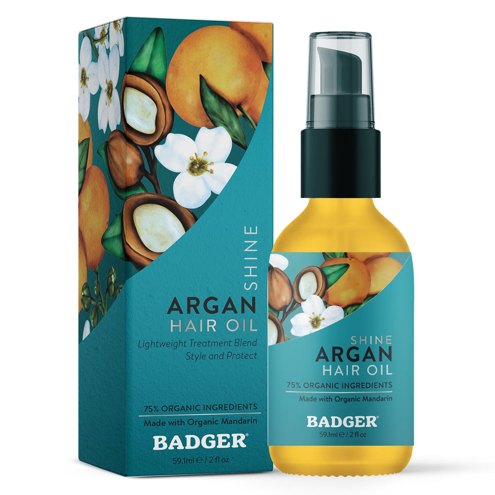 Badger Argan Hair Oil bottle with pump for easy one-handed application.
