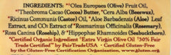 Badger cocoa butter lip balm ingredients close-up highlighting organic botanicals.