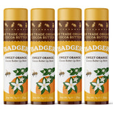 Badger Sweet Orange Cocoa Butter Lip Balm 4-pack sticks deliver long-lasting moisture.