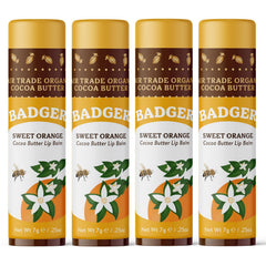 Badger Sweet Orange Cocoa Butter Lip Balm 4-pack sticks deliver long-lasting moisture.