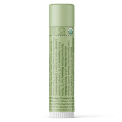 Badger Tea Tree Classic Lip Balm tube close-up showing silky glide and organic formula