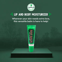 Bag Balm Original lip balm tube in hand for dry hands or cuticle care.