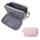 BAGSMART Toiletry Bag pink medium open compartment keeps bottles upright.