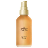 Bambu Earth Apple Cider Face Toner bottle on a bathroom shelf for balanced skin.