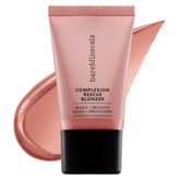bareMinerals Complexion Rescue Liquid Blonzer swatch on cheek delivers rosy-bronze glow.