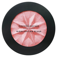bareMinerals Gen Nude Highlighting Blush Pink Glow swatch on cheek demonstrates seamless blend.