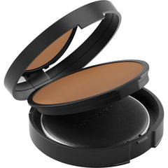 bareMinerals Veil powder swatch in Sheer Tan demonstrates pore-blurring finish.