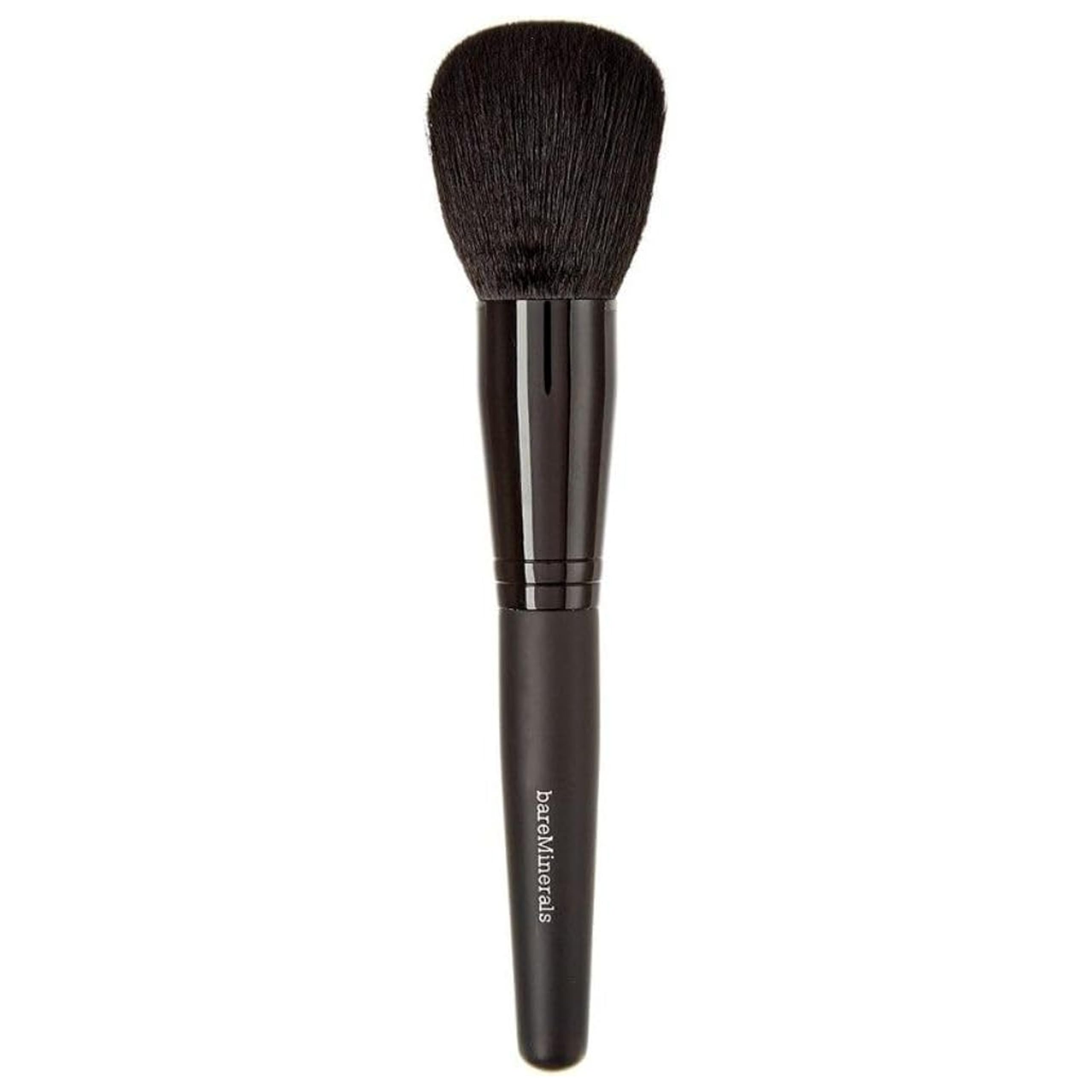 BareMinerals Supreme Finisher powder brush applying a sheer setting powder finish.