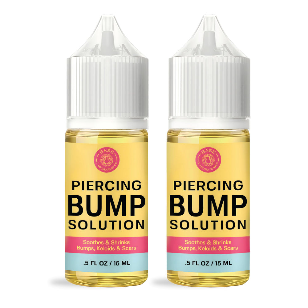 BASE LABORATORIES piercing bump removal bottle for at-home keloid care and soothing relief.