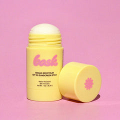 Bask SPF 50 stick shown being used with gloves during winter sports.