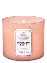 Bath & Body Works Champagne Toast 3-Wick candle jar creates warm ambiance for entertaining
