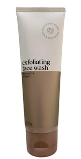 Bath & Body Works exfoliating face wash bottle pouring for gentle cleansing with aloe and vitamin E.