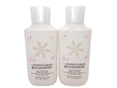 Bath and Body Works Snowflakes and Cashmere 8oz bottles front view for silky hydration.