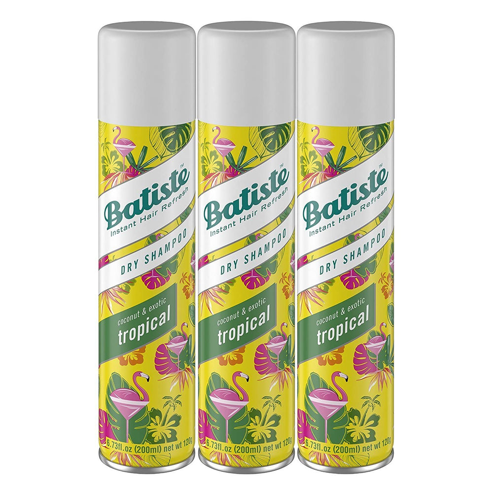 Batiste Tropical Dry Shampoo bottle refreshes hair by absorbing oil between washes.