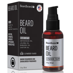 Beardbrand beard oil bottle shows jojoba and Vitamin E for silky-smooth beard.