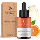 Beauty by Earth Vitamin C Serum bottle — USA-made antioxidant skincare.