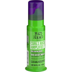 Bed Head Curls Rock Amplifier product swirl shows creamy texture for defined, hydrated curls.