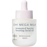 Beekman 1802 Oh! Mega Milky Oil bottle closeup showing a silky glow and barrier support.