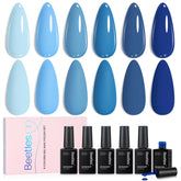 Beetles Gel Polish set swatches show six ocean blues for chic holiday nails.