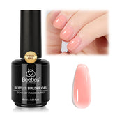 Beetles Builder Gel nude pink jelly texture on nails for natural coverage.