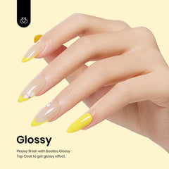 Beetles Gel Polish Canary Yellow on hand demonstrates long-lasting color and glossy finish