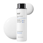belif Moisturizing Bomb Toner bottle closeup shows milky hydration for dewy skin