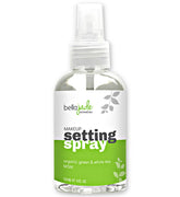 Bella Jade makeup setting spray bottle releasing a fine mist for all-day hydration