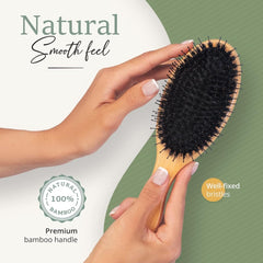 Belula Boar Bristle Brush on hair demonstrating detangling for long or curly hair types.
