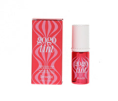 Benefit Gogo Tint bottle closeup showcasing bright cherry color for lips.